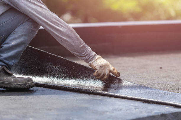Professional Emergency Waterproofing technician working in Reston, VA